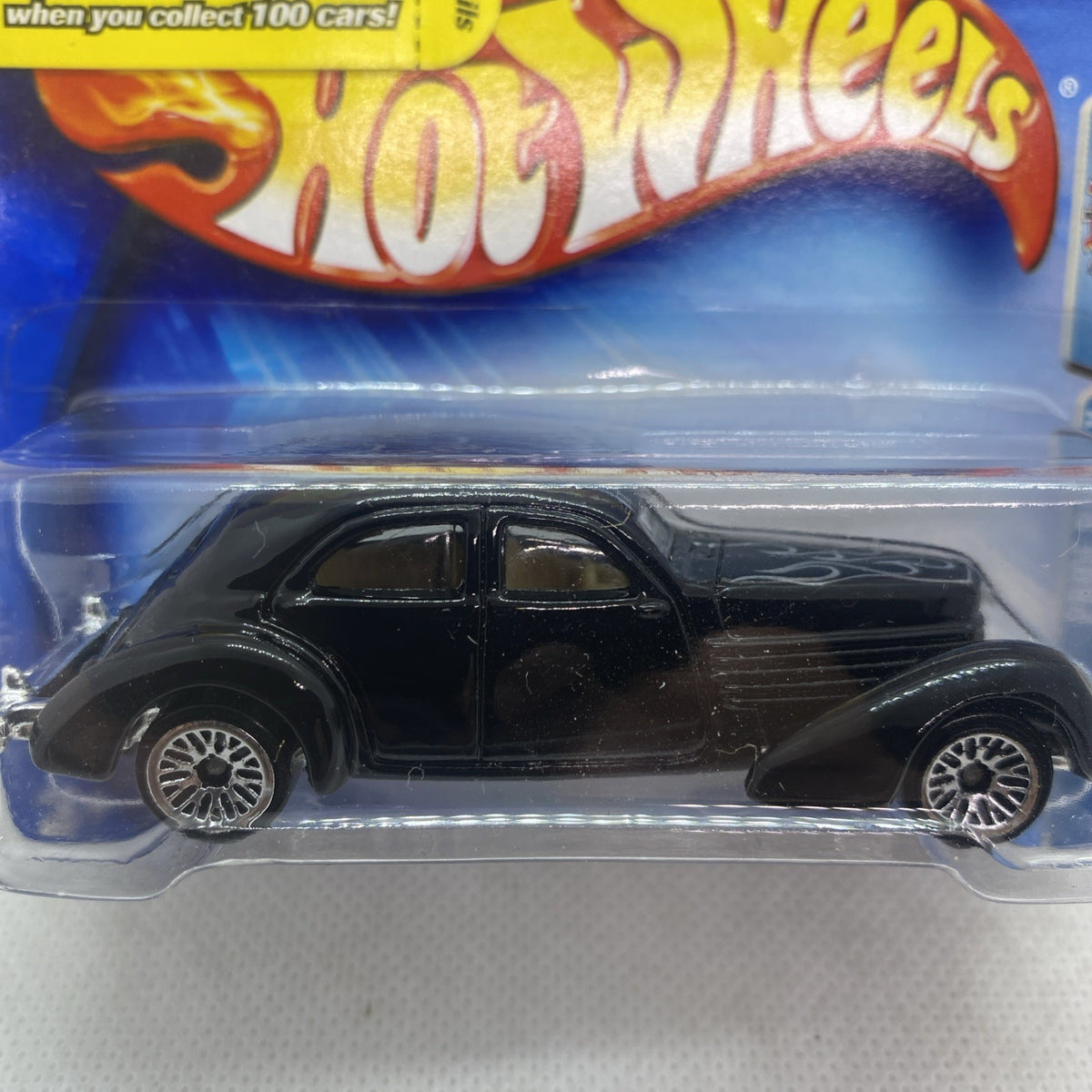 Hot Wheels 1936 Cord 2004 black die-cast car close-up in clear blister