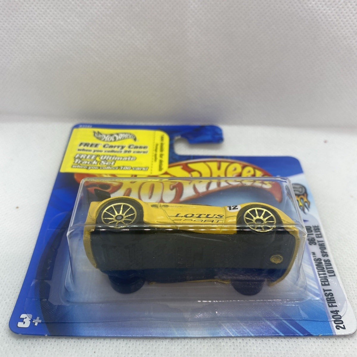 Yellow Hot Wheels Lotus Sport Elise die-cast in blister pack, close side profile