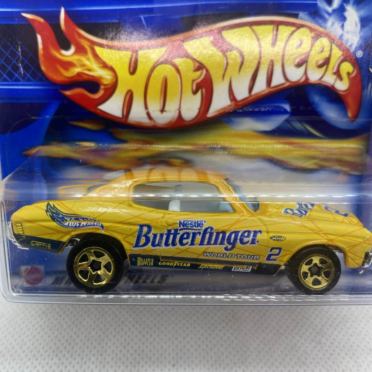 Hot Wheels die-cast yellow car blister pack, Butterfinger livery and flame logo