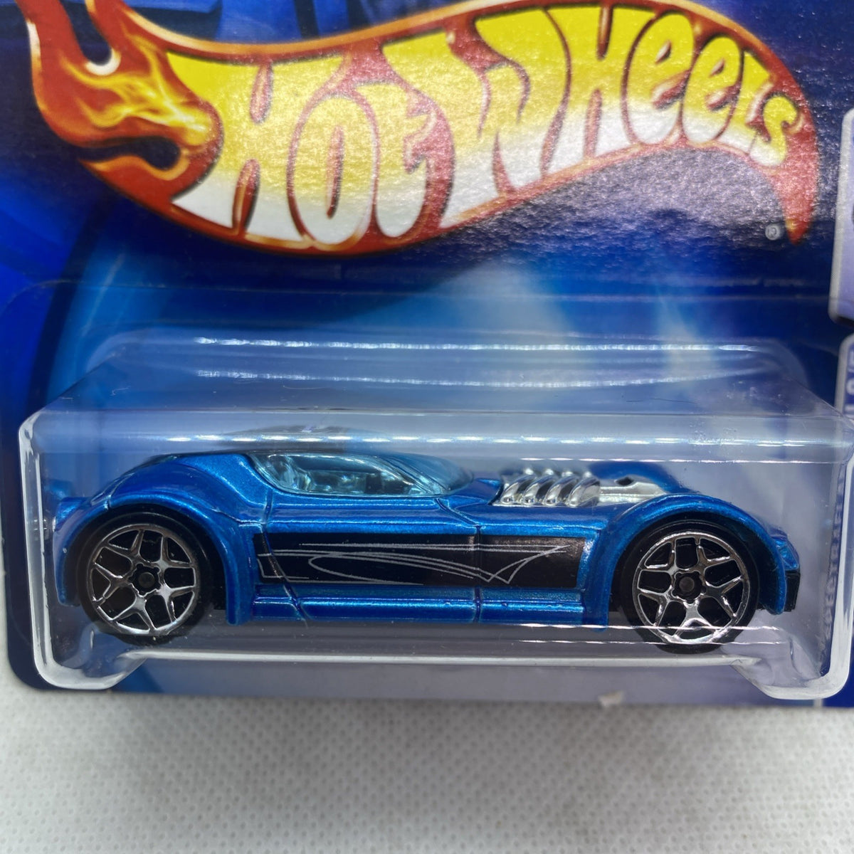 Hot Wheels Spectraflame II blue die-cast car close-up in clear blister