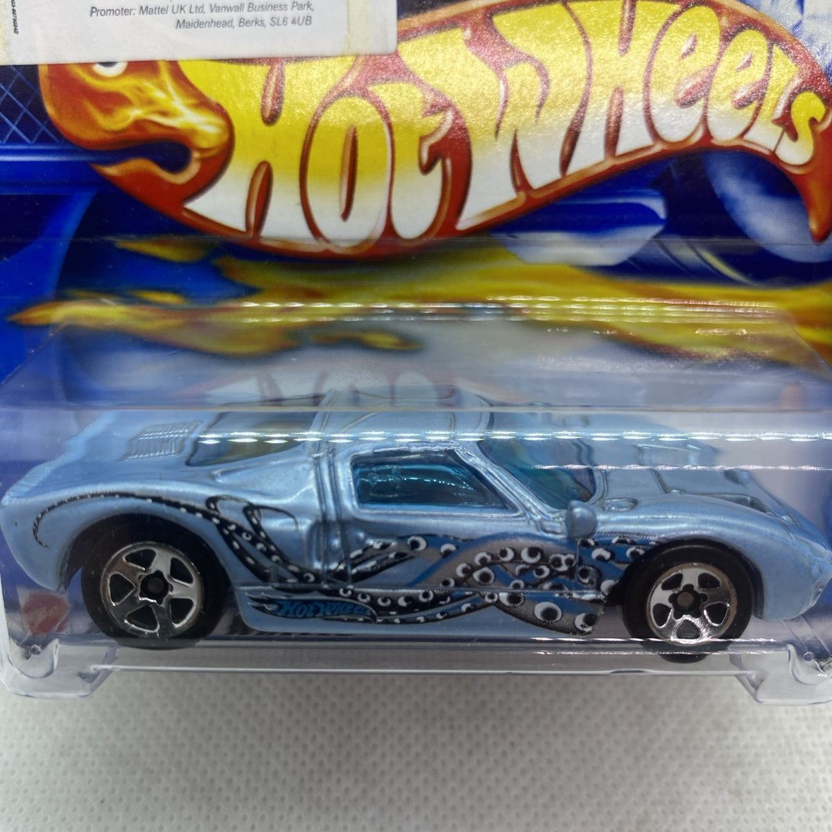 Hot Wheels Ford GT-40 die-cast car close-up in clear blister, silver body