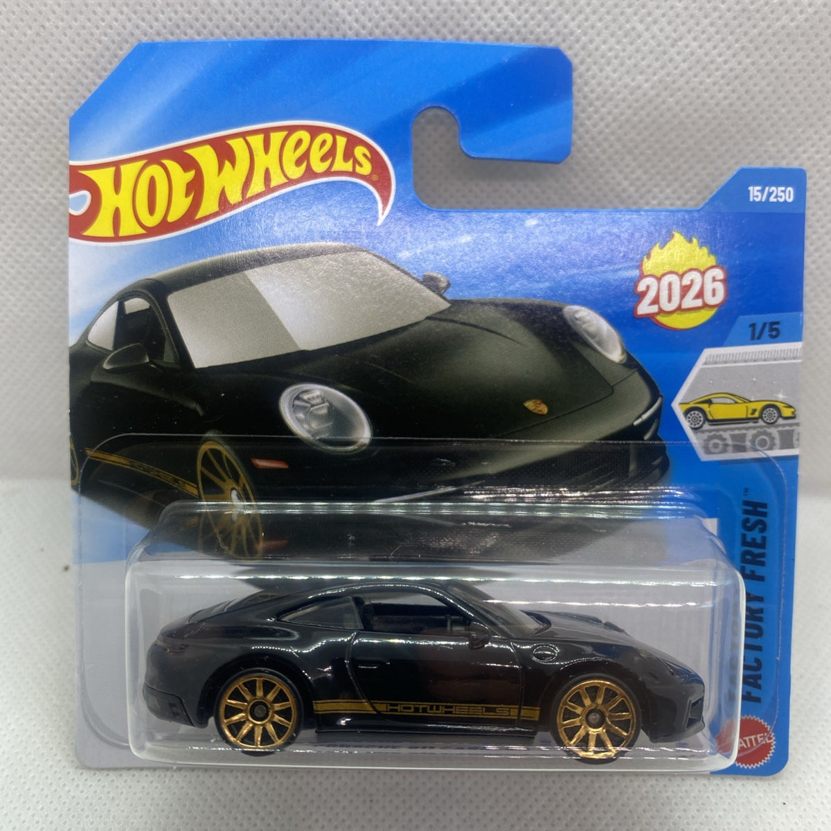 Hot Wheels black Porsche 911 Carrera T die-cast toy car in clear blister card