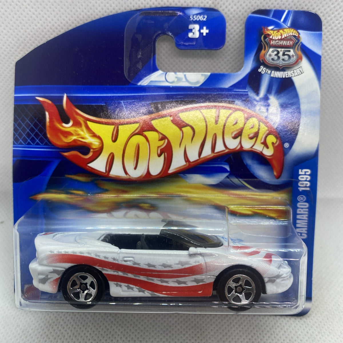 Hot Wheels die-cast Camaro convertible in clear blister, white with red flame graphics