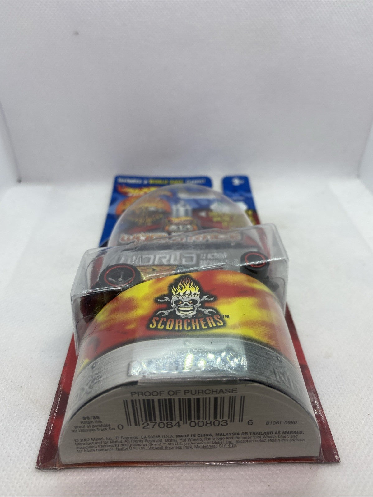 Sealed blister pack front with Scorchers artwork and packaged race car
