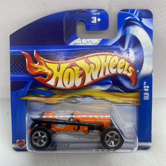 Hot Wheels orange die-cast car in blue blister package, 5-spoke wheels