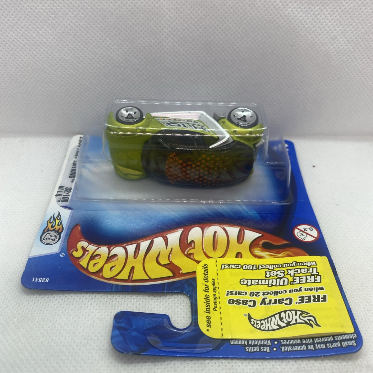 Lime green die-cast car in clear blister on blue Hot Wheels card, top view
