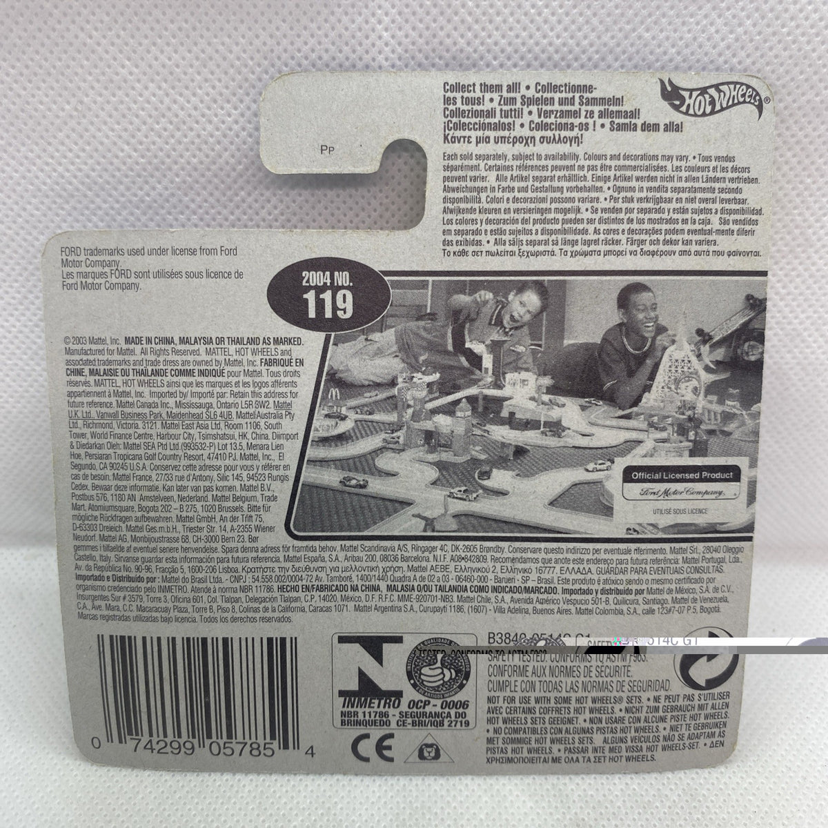 Hot Wheels die-cast car blister on back card with product info and barcode