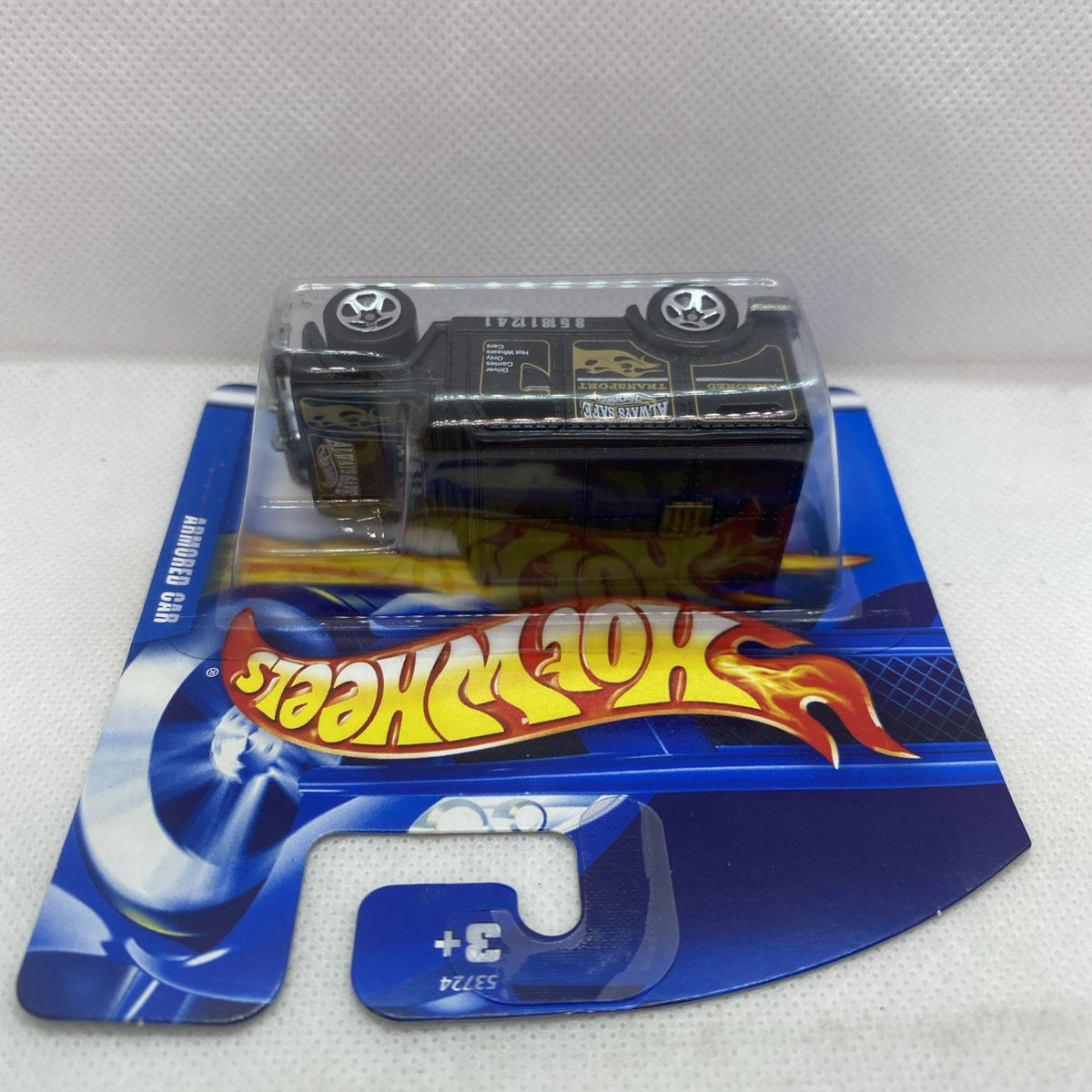 Hot Wheels armored car die-cast in clear blister, top view