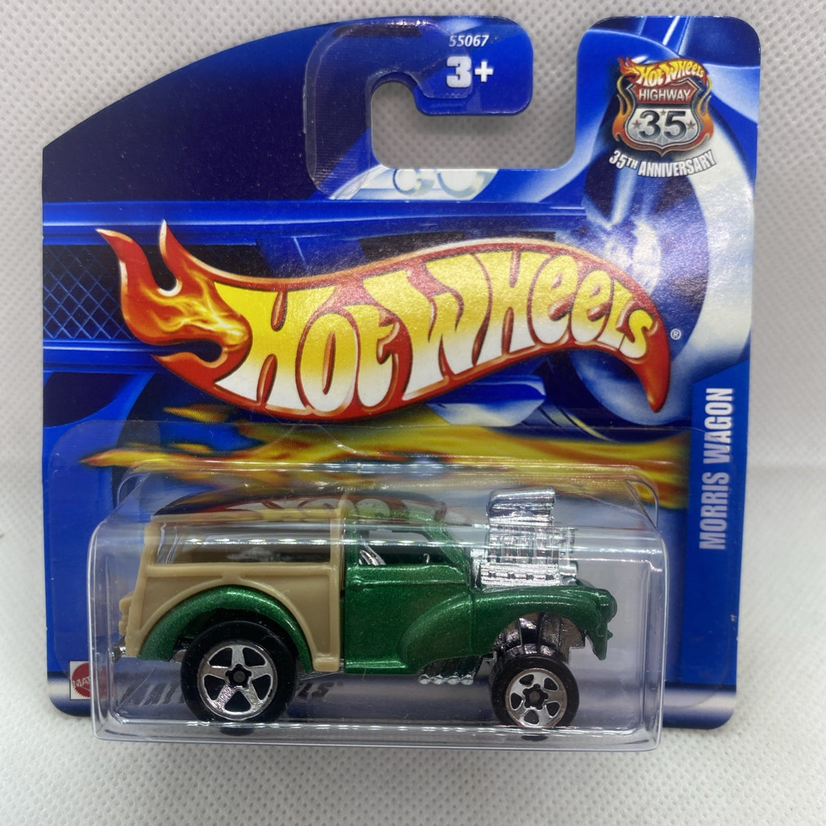 Hot Wheels Morris Wagon 2002 die-cast in clear blister, green body with tan side panel