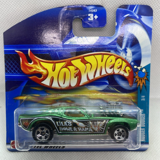 Green Hot Wheels die-cast car in clear blister on blue short card packaging