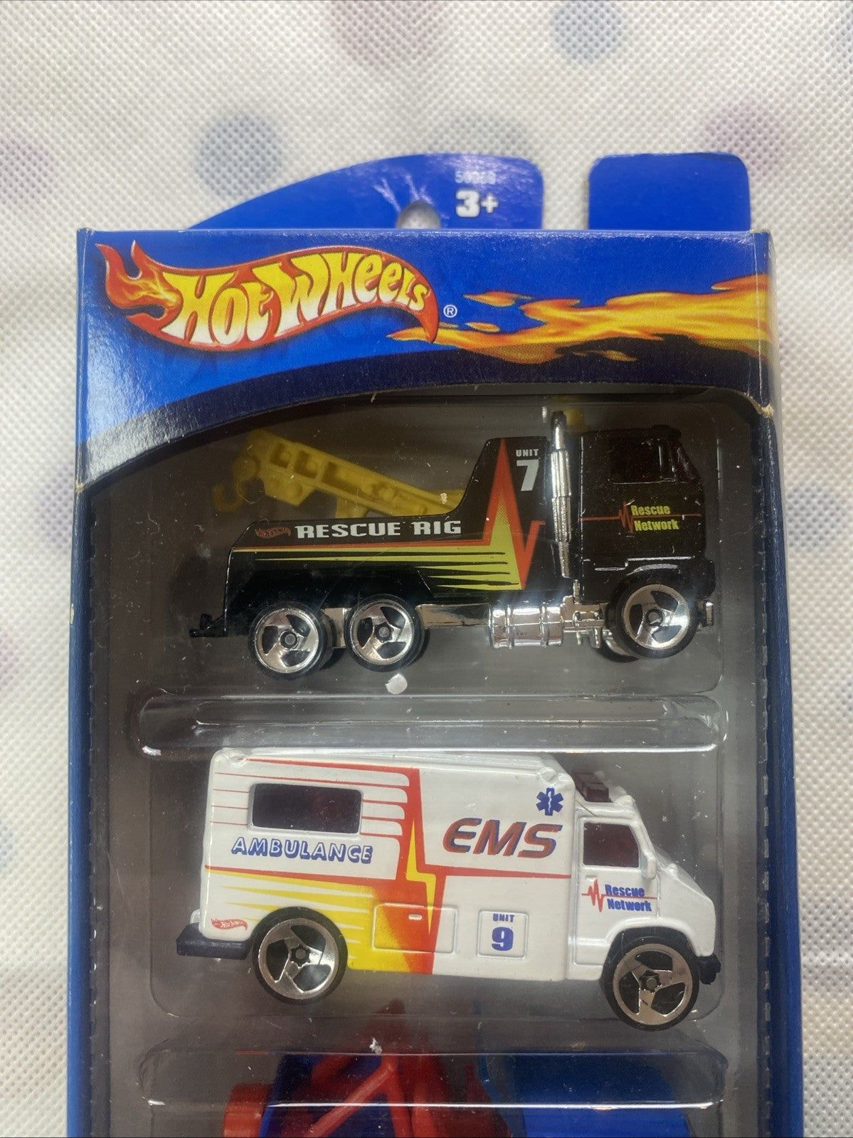 Diecast rescue vehicles in box: Rescue Rig truck and EMS ambulance