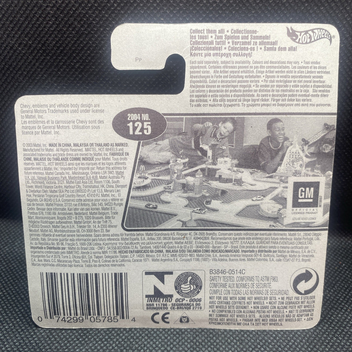 Hot Wheels short card back with product info, 125 label, and GM logo