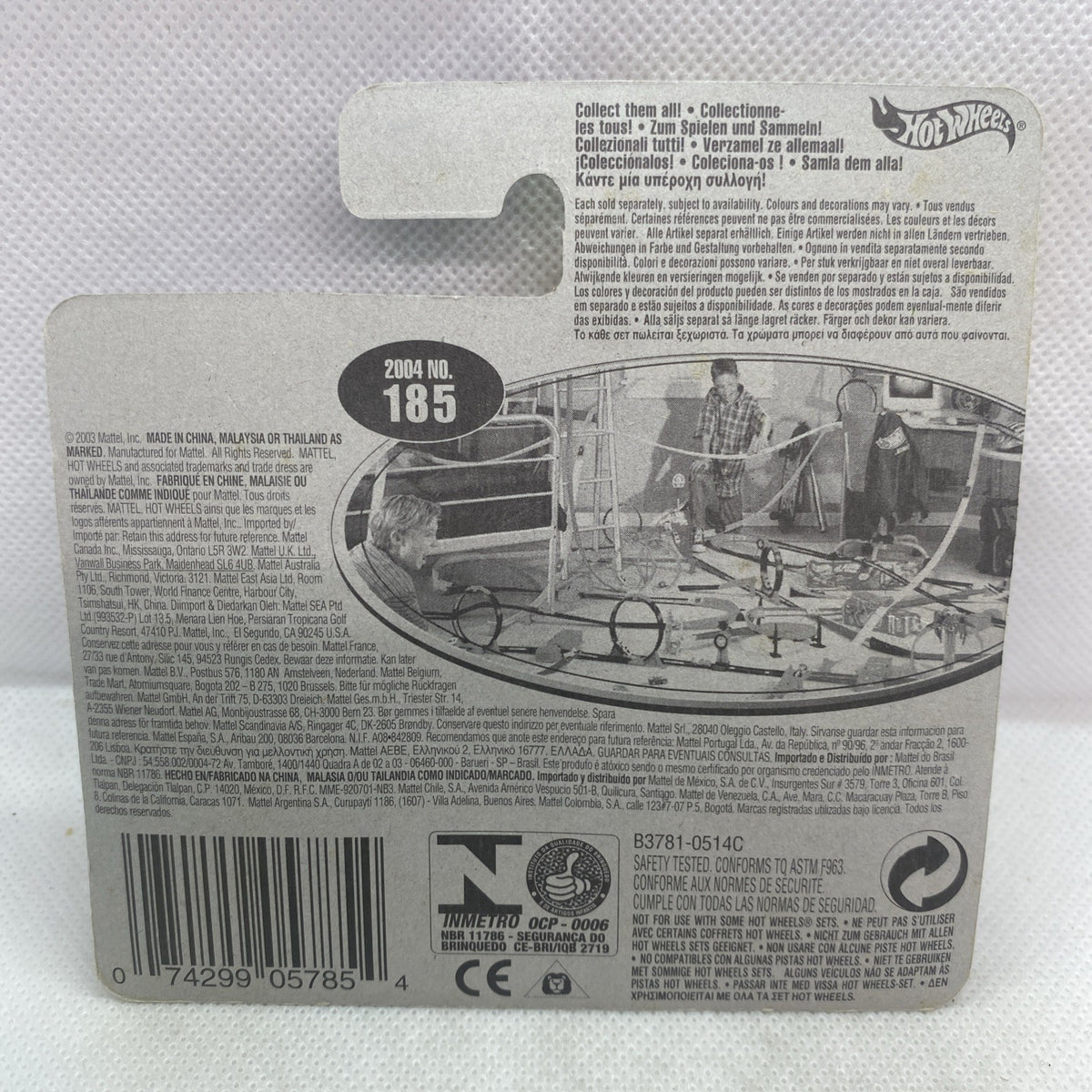 Hot Wheels toy truck blister card back with printed details, barcode, and CE marks