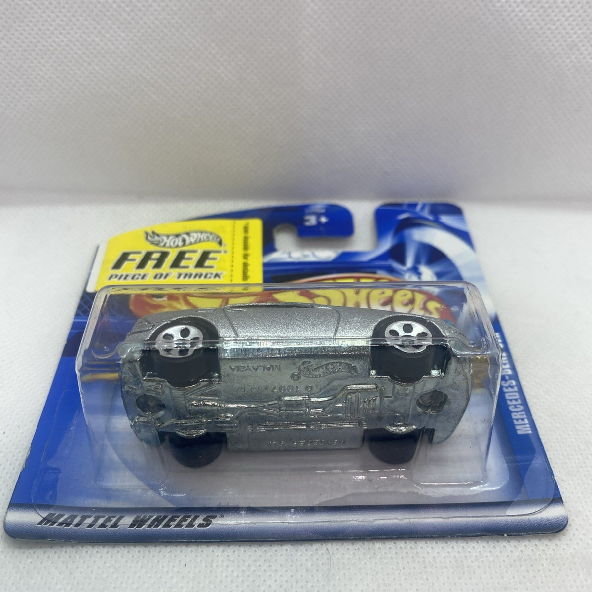 Hot Wheels Mercedes-Benz SLK 2001 toy car in clear blister, rear view