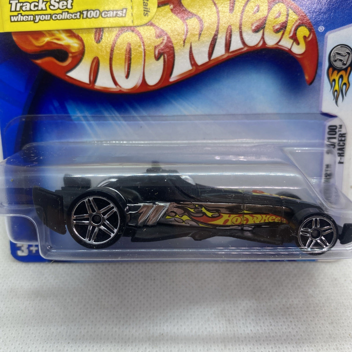 Hot Wheels F-Racer 2004 black die-cast car in blister, side view
