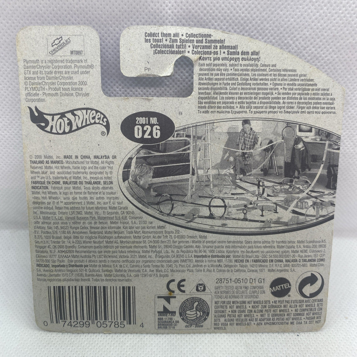 Hot Wheels blister card back with printed details, '2001 No. 026' and icons
