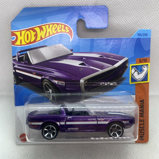 Hot Wheels purple muscle car die-cast in blue blister card, Muscle Mania series