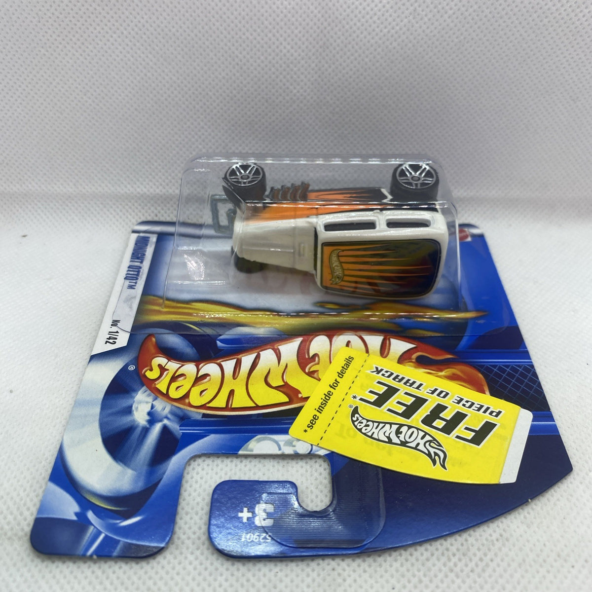 Hot Wheels Midnight Otto die-cast car with orange flames in sealed blister pack