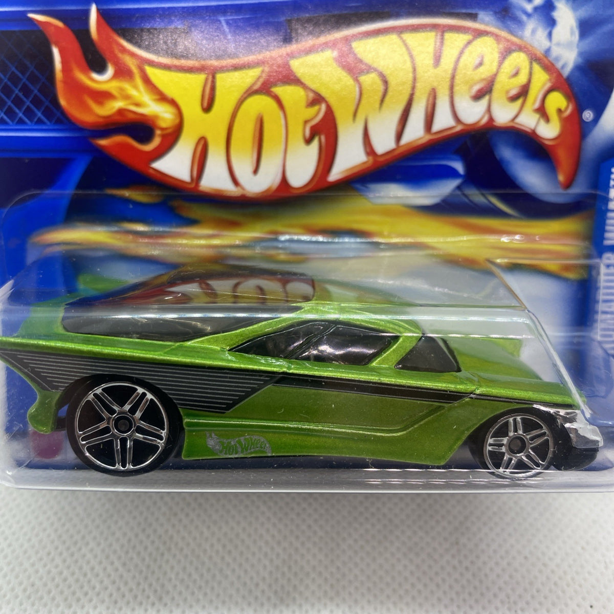 Green Hot Wheels die-cast car in blister card with flame Hot Wheels logo header