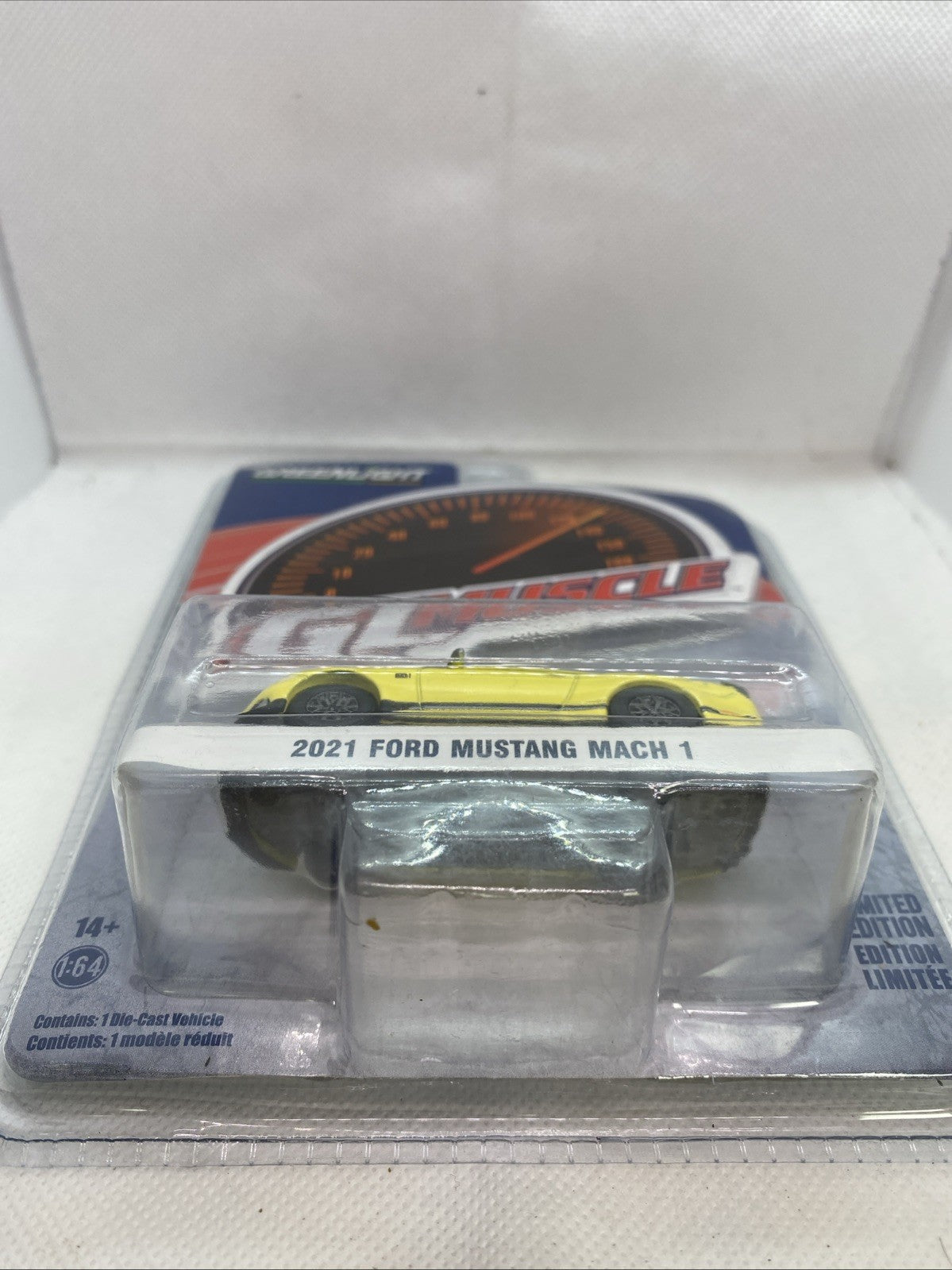 Sealed 1:64 Ford Mustang Mach 1 die-cast car, yellow, in GL Muscle blister