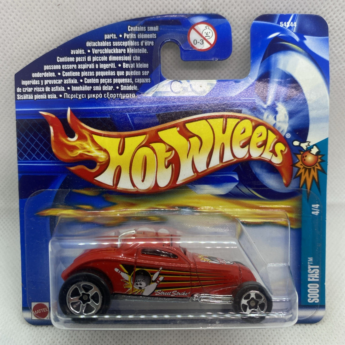 Hot Wheels die-cast red car in blister pack, flame graphics and black wheels