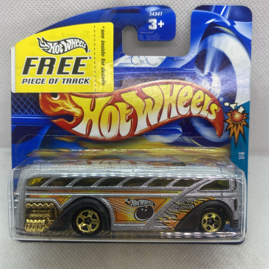 Hot Wheels school bus die-cast toy in blister card, orange flame graphics, black wheels
