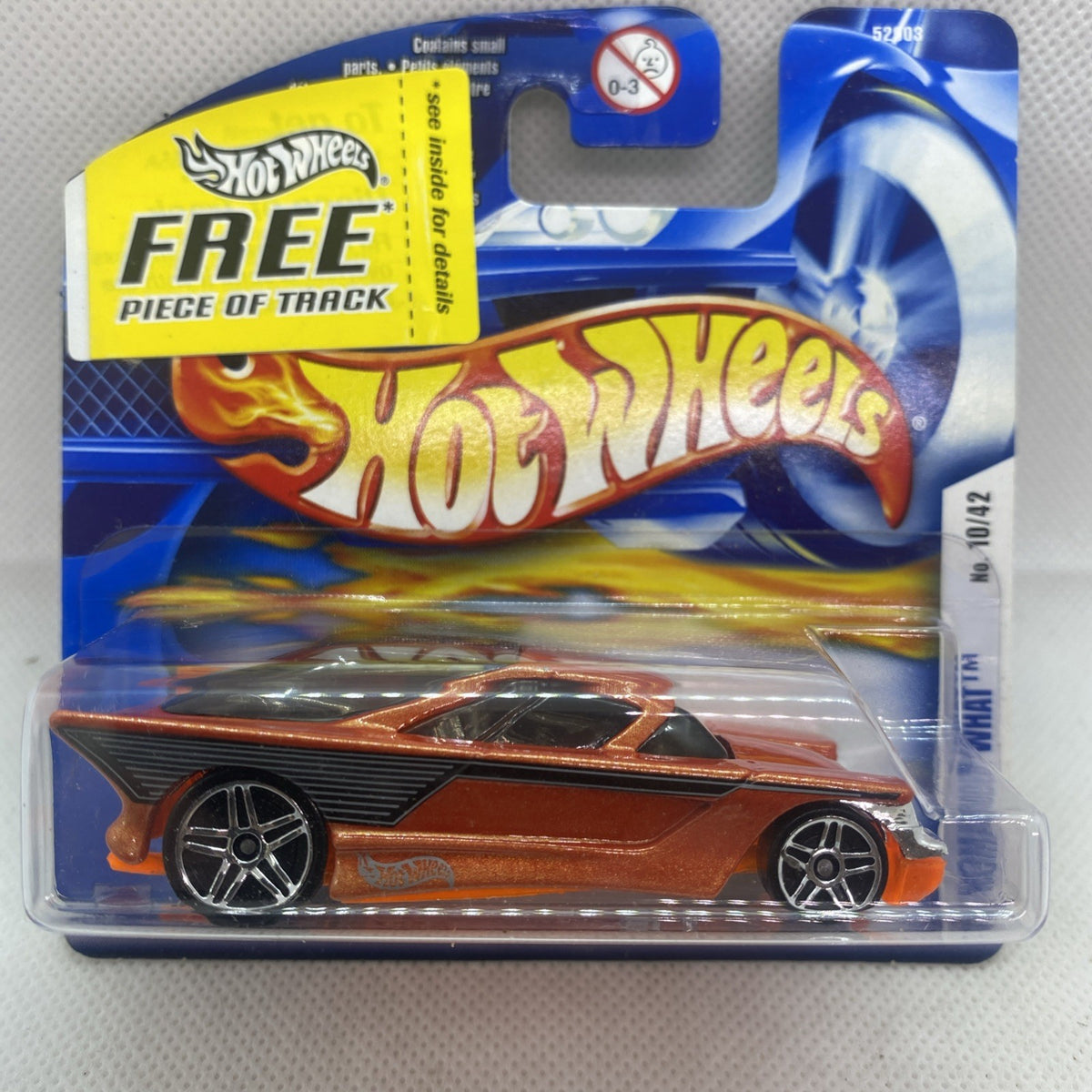 Hot Wheels 2002 die-cast car on short card, sealed blister packaging with flames