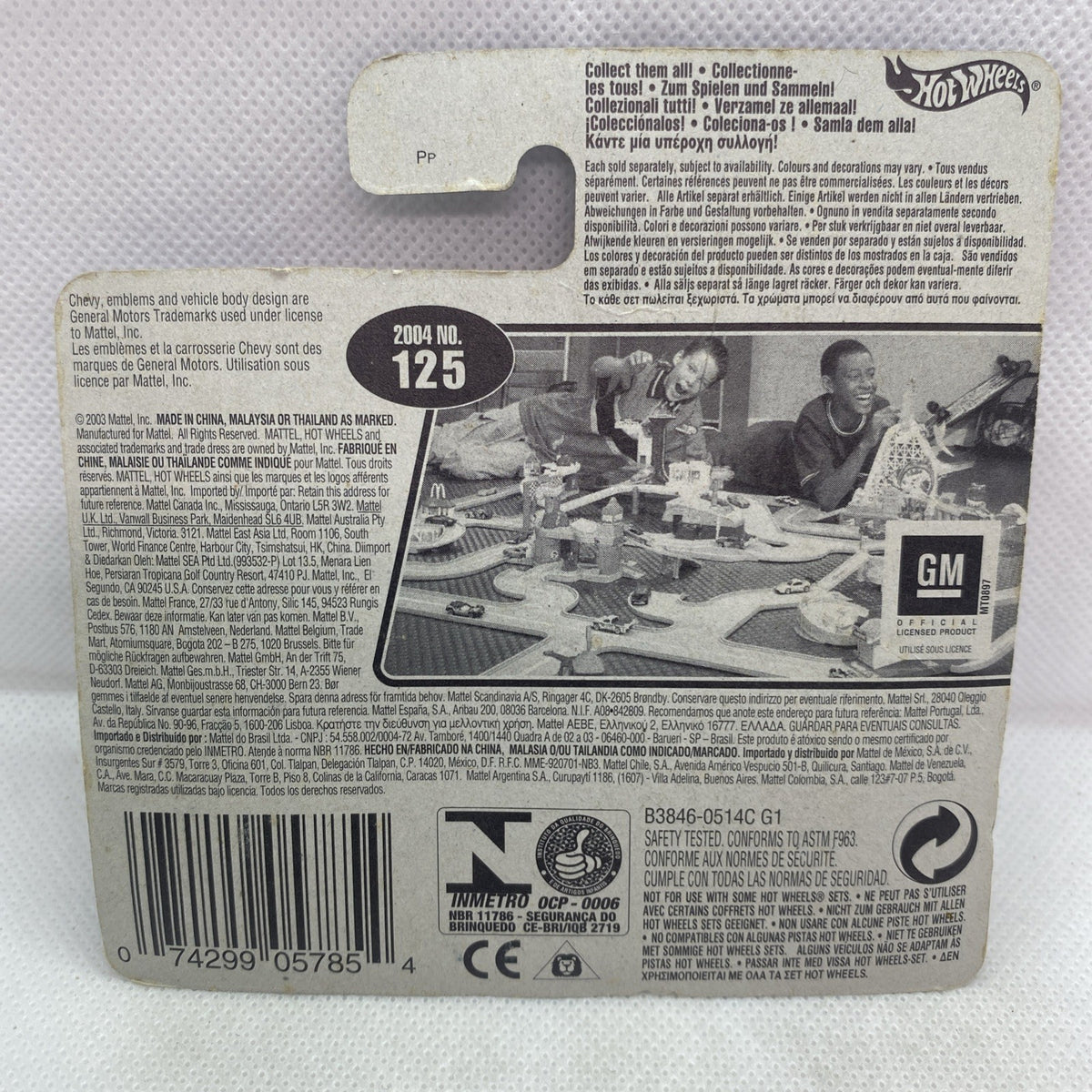 Hot Wheels blister back card with product info, number badge '125', and barcode