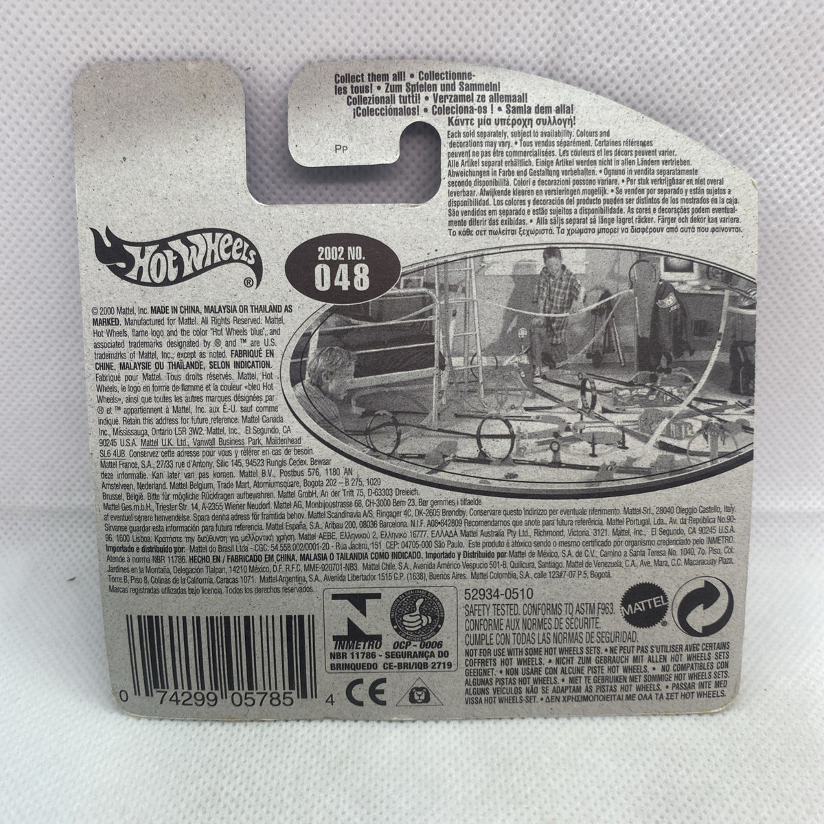 Hot Wheels short card back with collector info and car number 048, blister insert