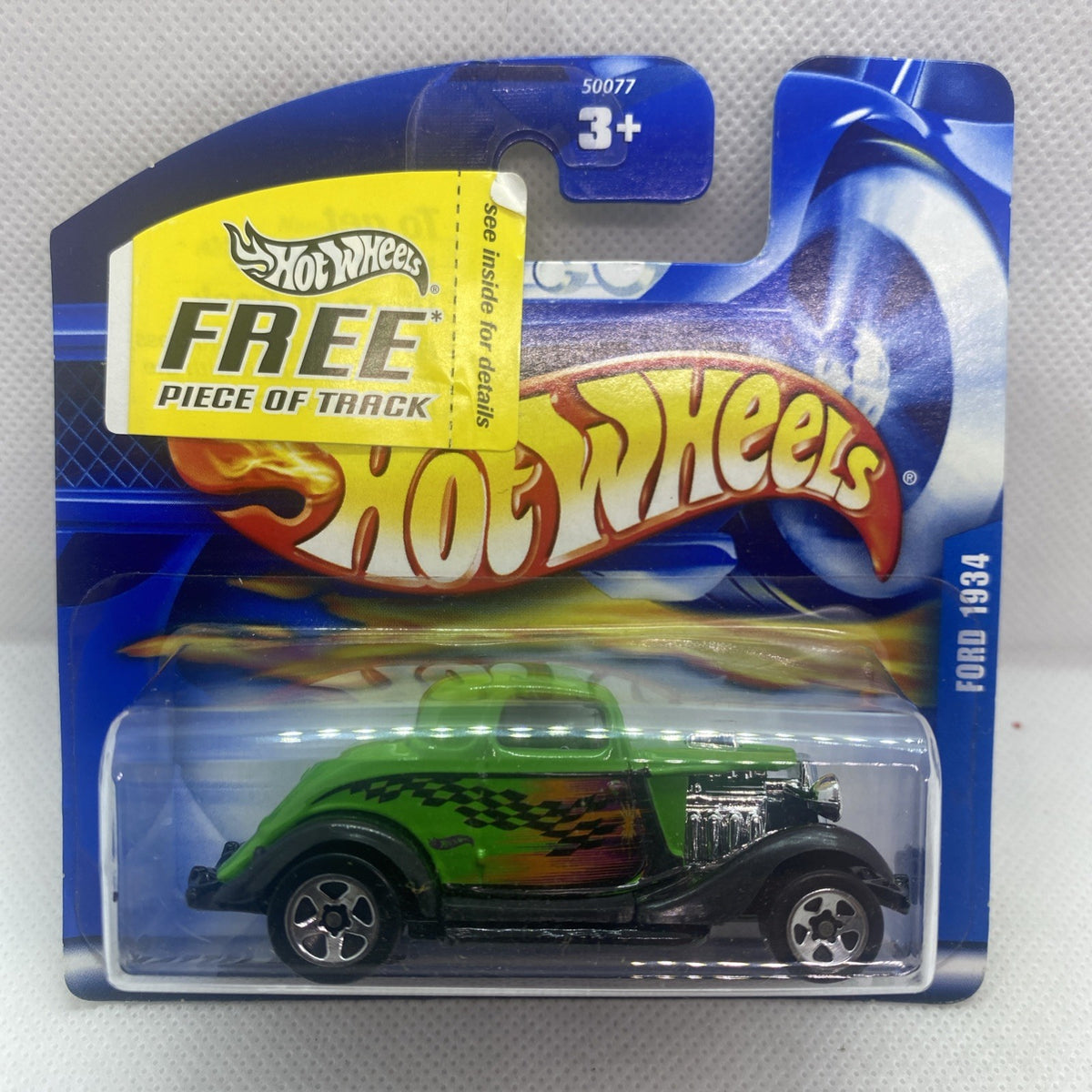 Hot Wheels green '34 Ford die-cast car on sealed blister card
