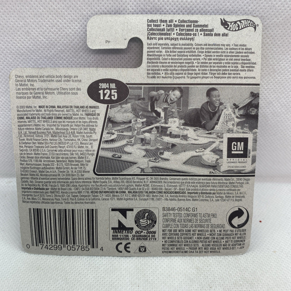 Hot Wheels 1957 Chevy die-cast car, short-card back view with label