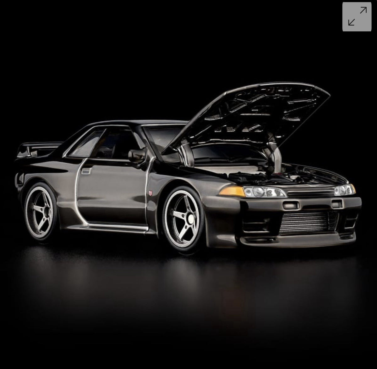 RLC Nissan Skyline GT-R model car in gray, front 3/4 view, hood open
