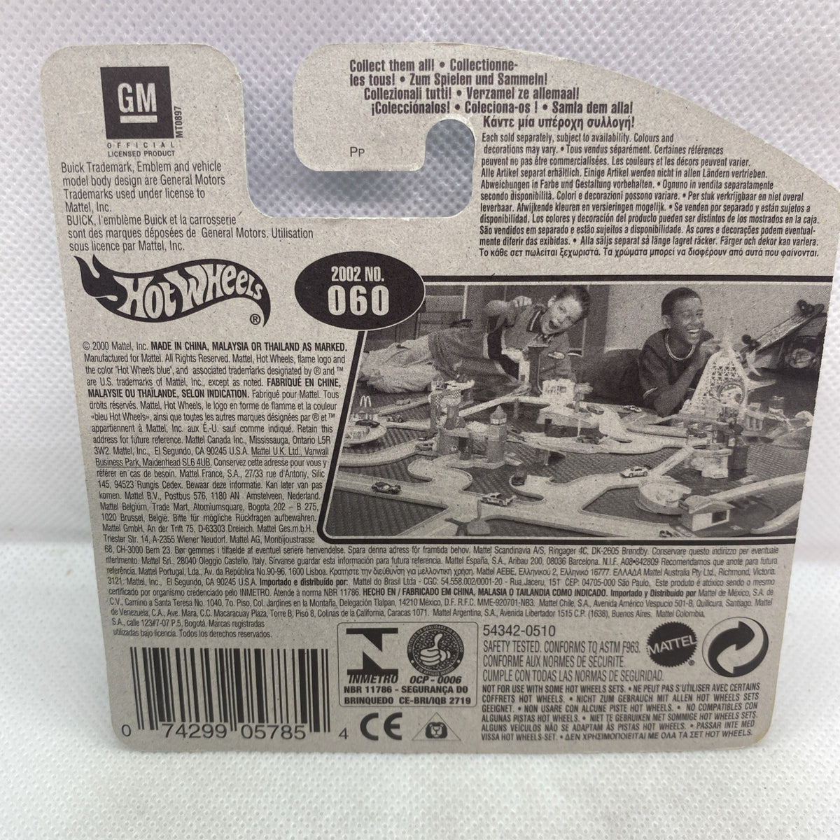 Back of die-cast truck blister card with GM label and 2002 No. 060 details