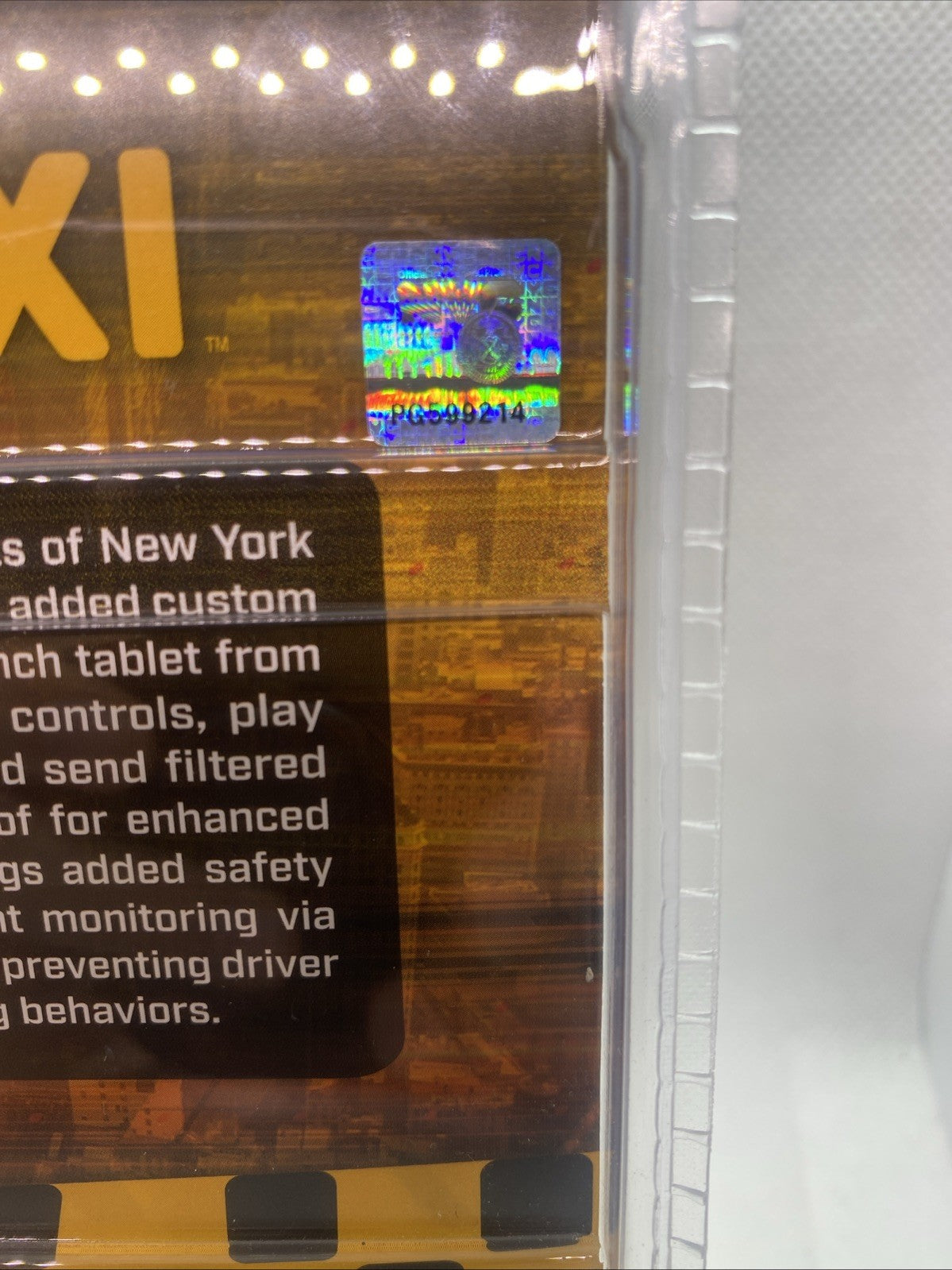 NYC Taxi packaging insert close-up with printed description and blister window.