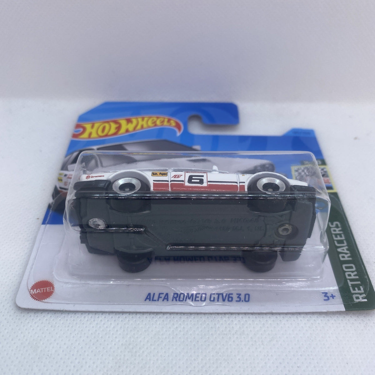 Hot Wheels Alfa Romeo GTV6 3.0 race car in blister, white with red stripe
