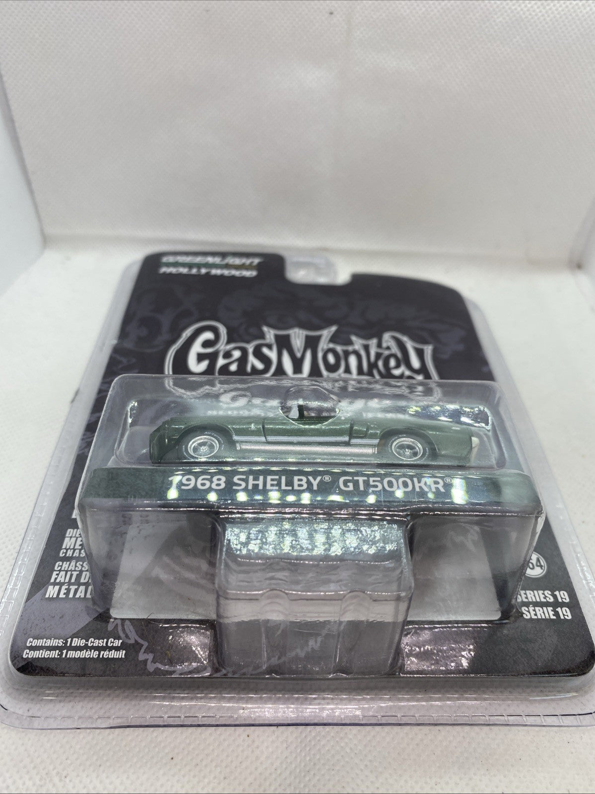 Greenlight die-cast car front view in clear blister, green 1968 Shelby GT500KR