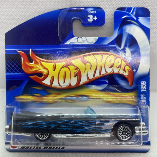 Hot Wheels die-cast '59 Cadillac on blue blister card, black flame details