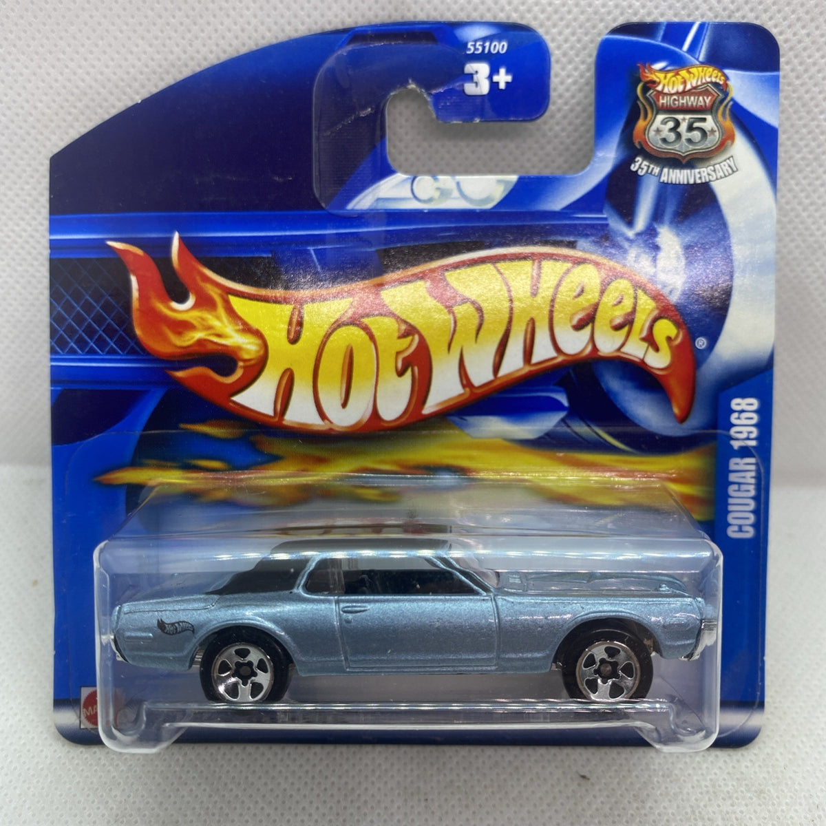 Hot Wheels die-cast ’68 Cougar in silver on blue blister card, front view