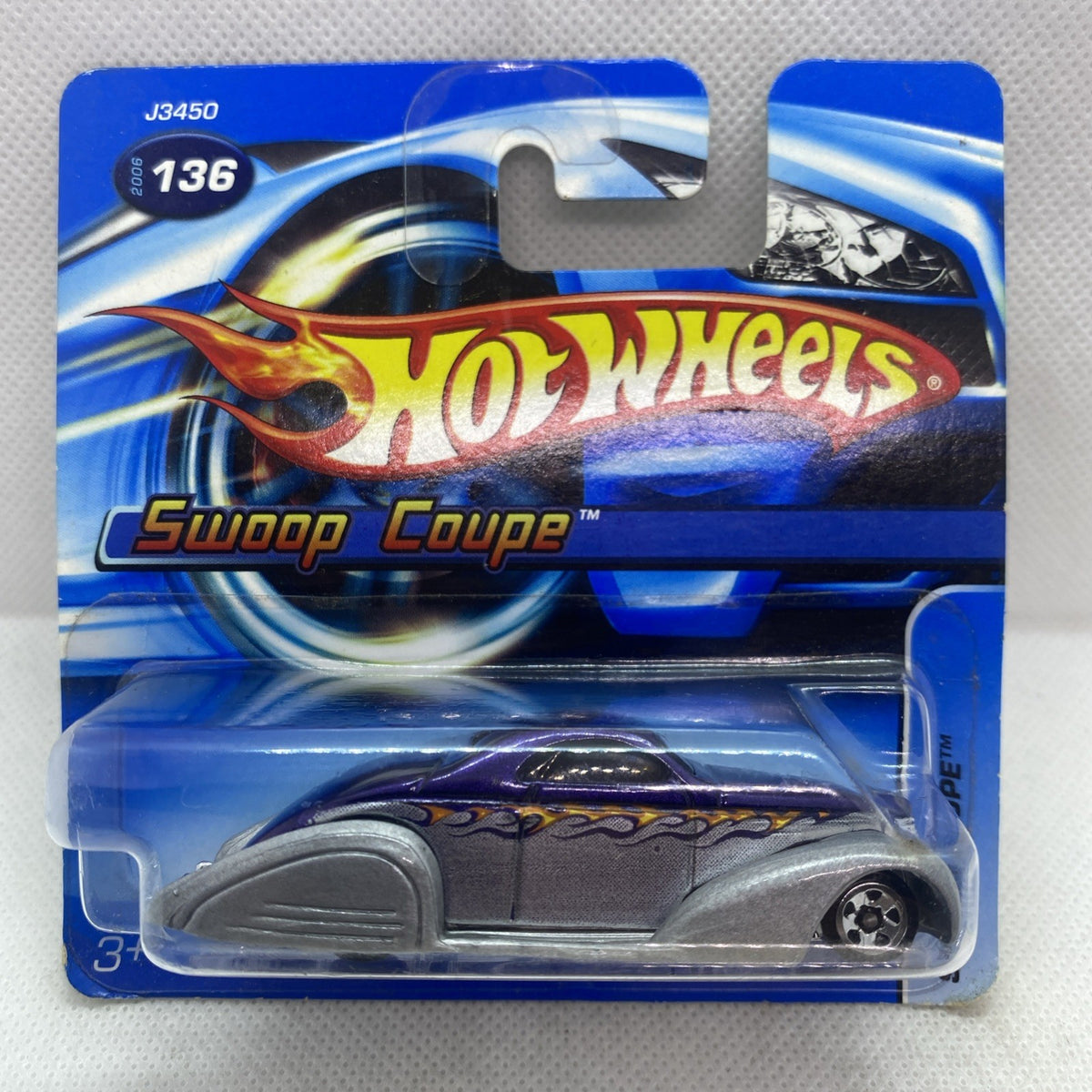 Hot Wheels Swoop Coupe #136 toy car on blue short card in sealed blister package.