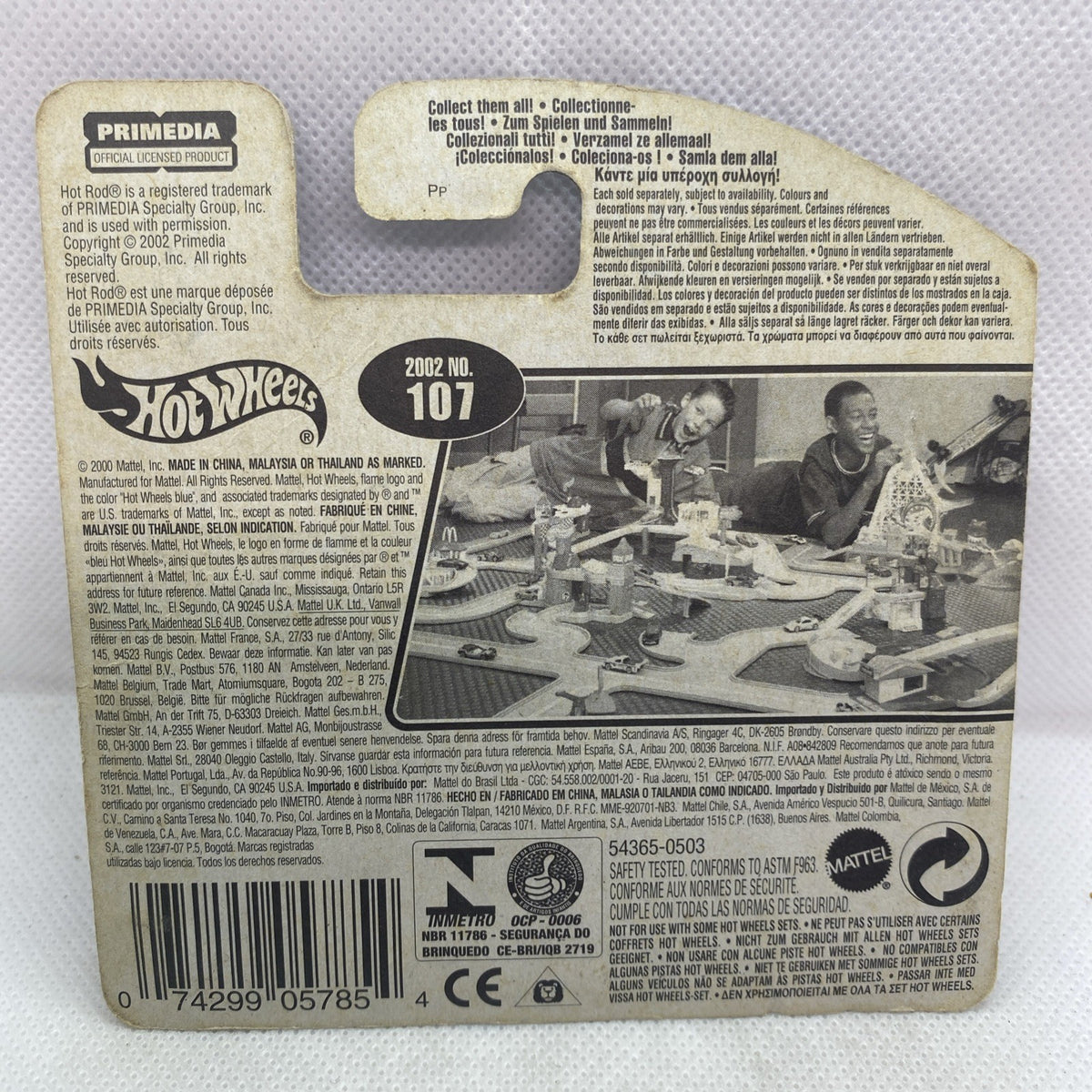 Hot Wheels Purple Passion 2002 #107 back of packaging with product text and barcode