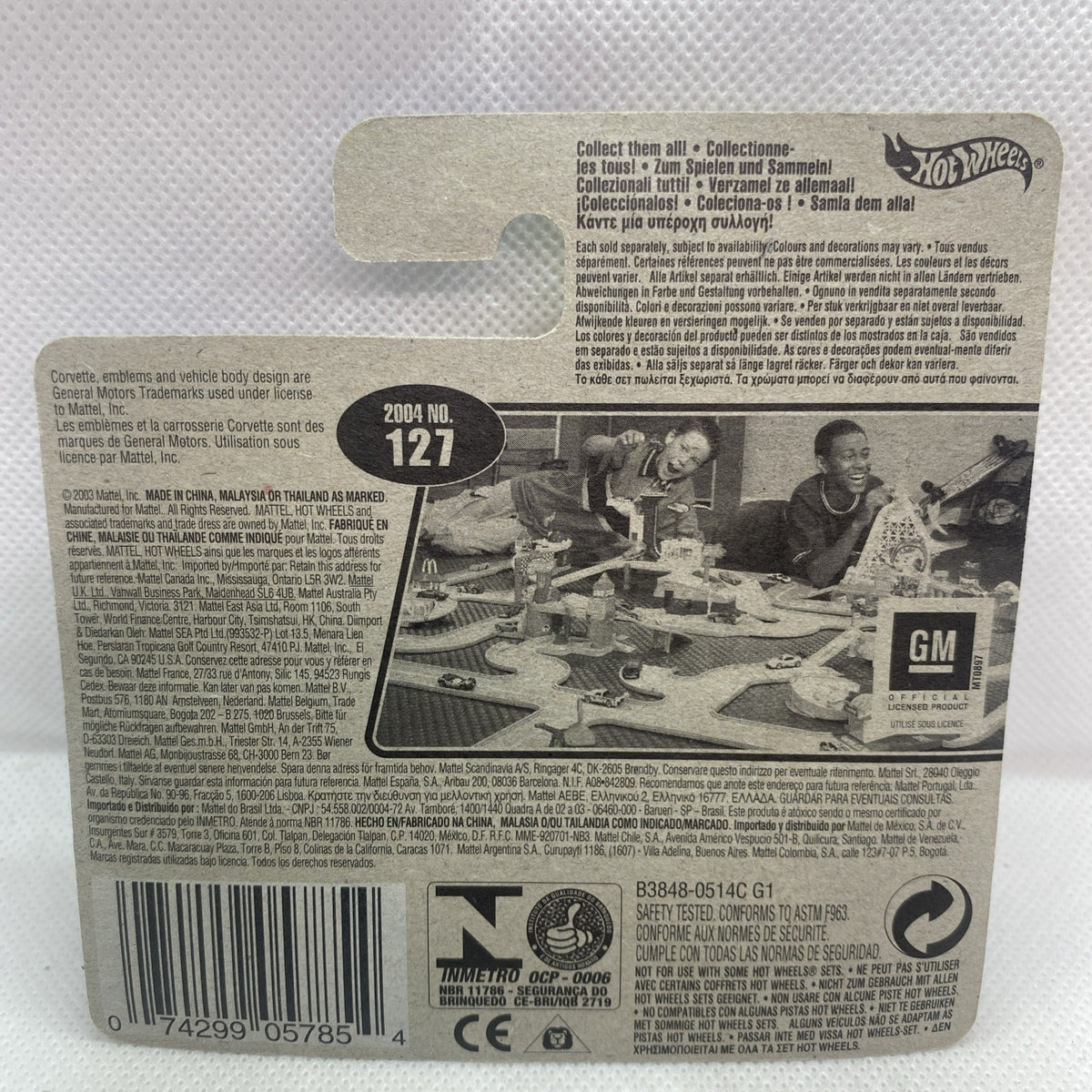 Hot Wheels blister card back with barcode, model number 127, and safety info text