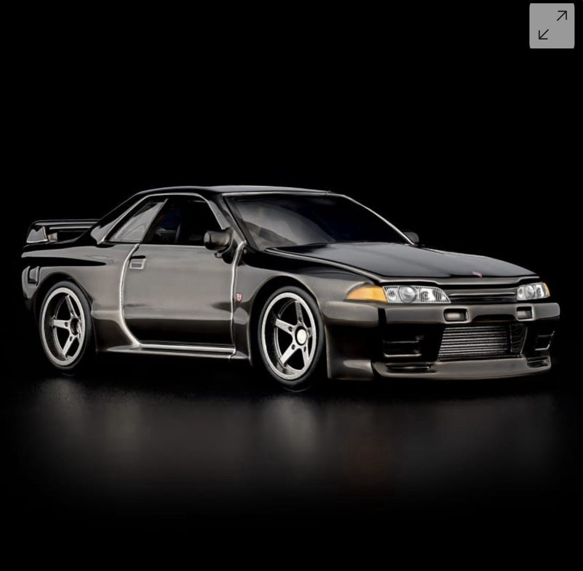 RLC Nissan Skyline GT-R model car in gray, front 3/4 view, hood closed