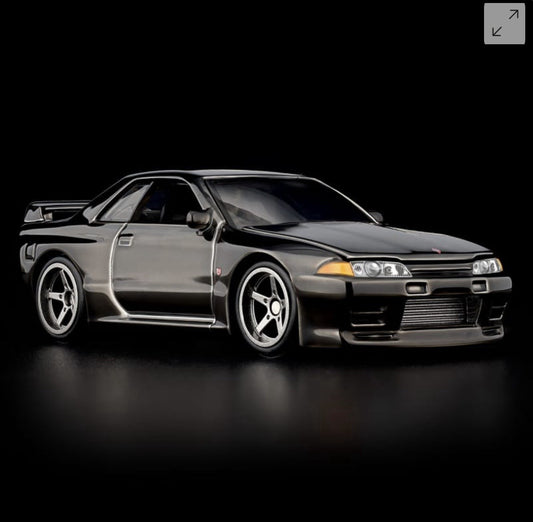 RLC Nissan Skyline GT-R model car in gray, front 3/4 view, hood closed