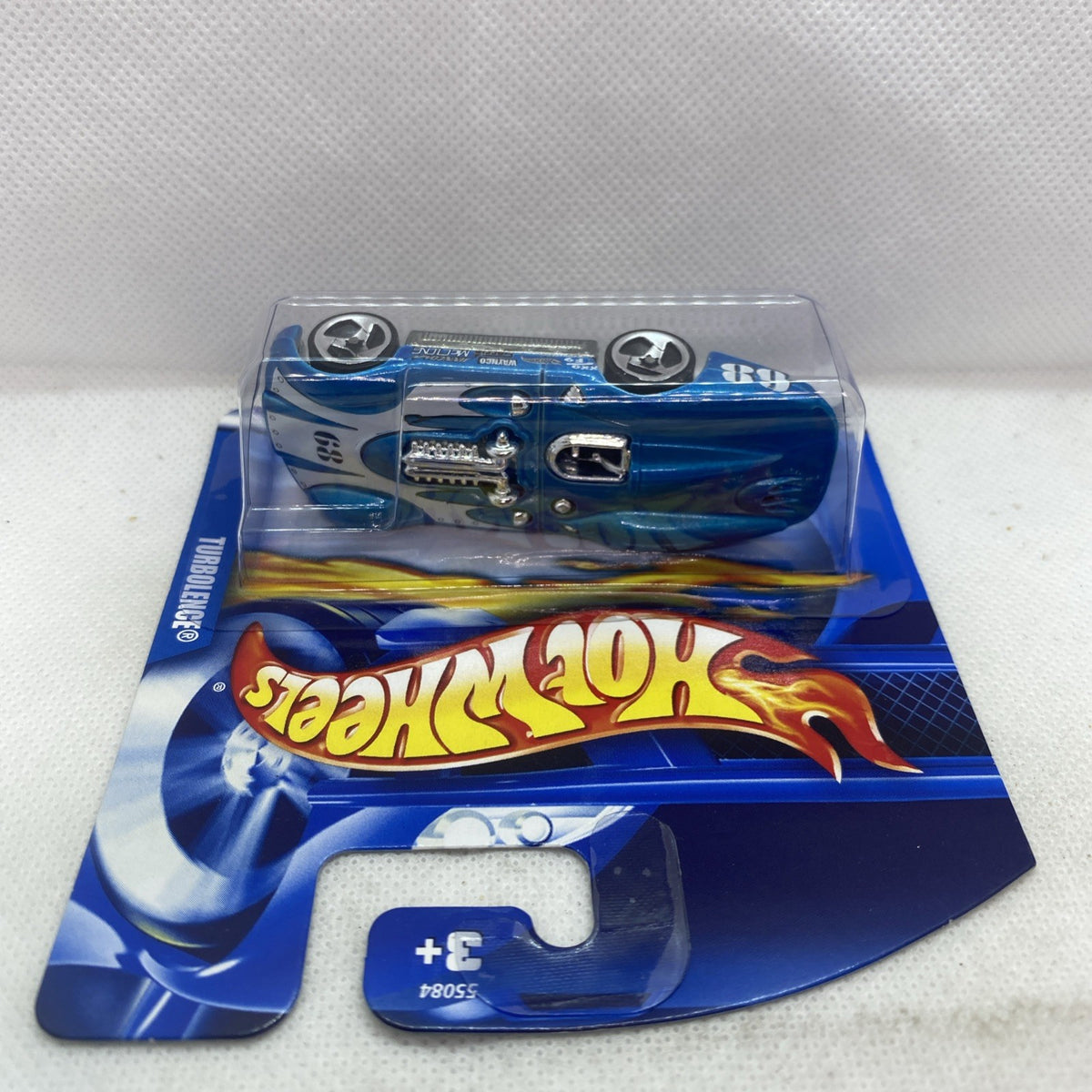 Blue Hot Wheels die-cast car in clear blister on card, flame Hot Wheels logo