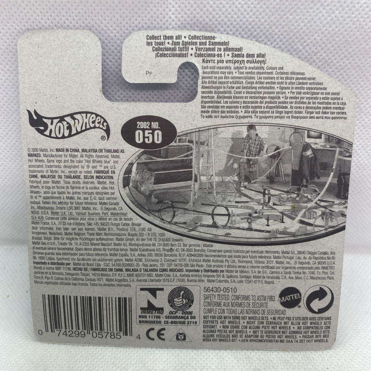 Hot Wheels die-cast car blister card back with barcode and vehicle info text