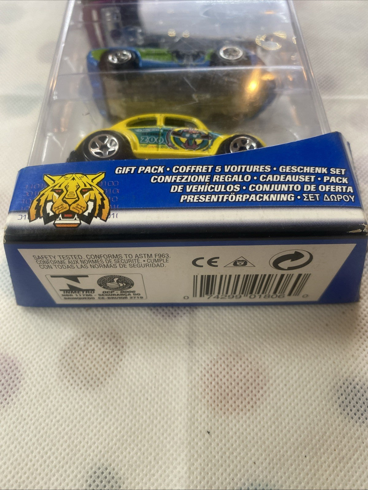Diecast yellow car in clear blister with ZOO graphic and chrome wheels