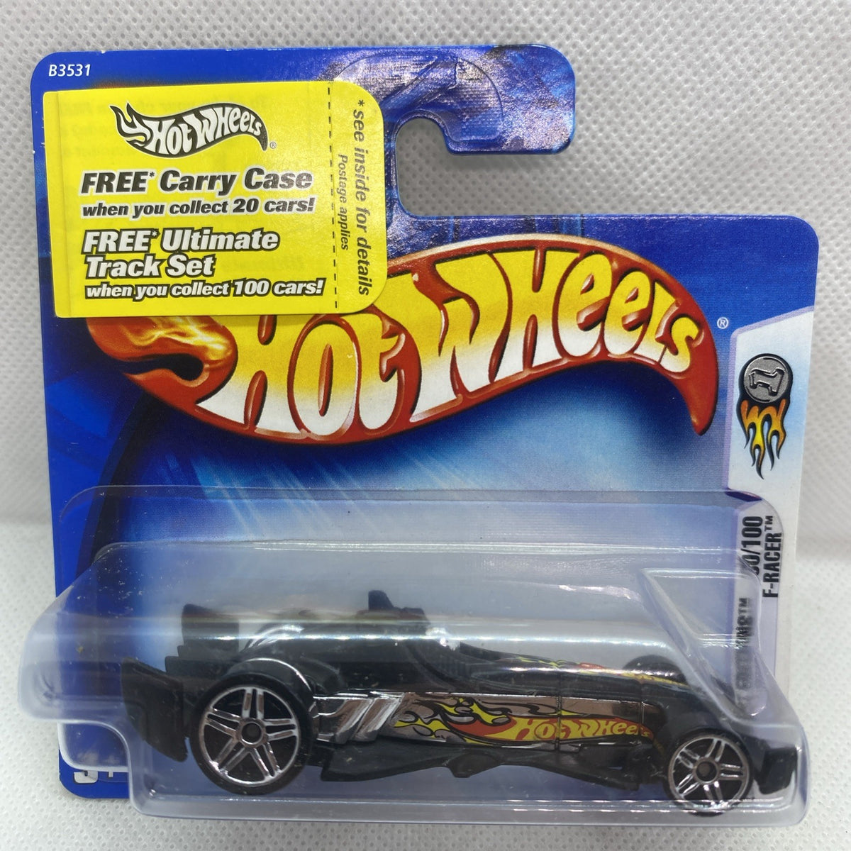 Hot Wheels black die-cast F-Racer 2004 in blister card, front side view