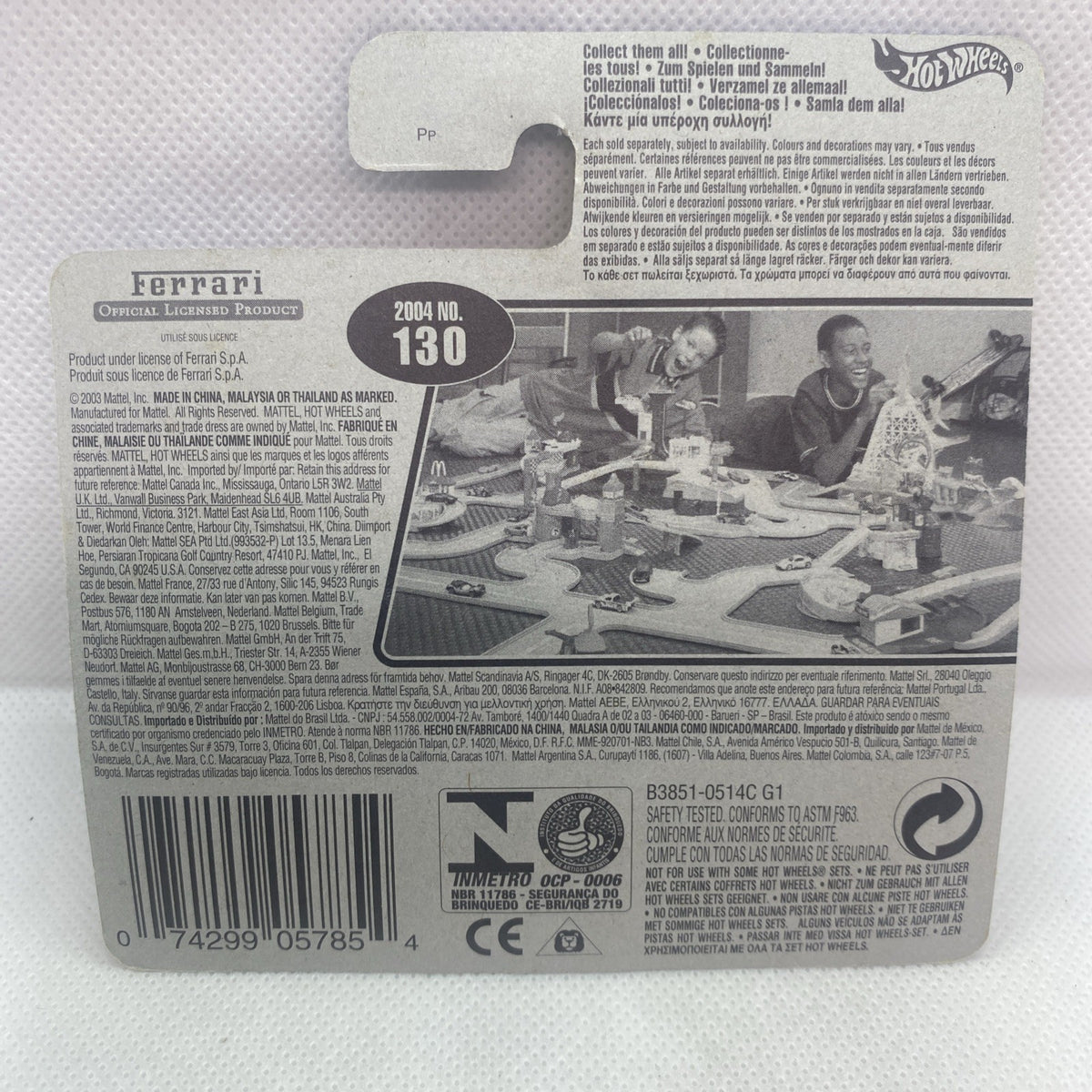 Back of Hot Wheels collectible card with Ferrari details and barcode