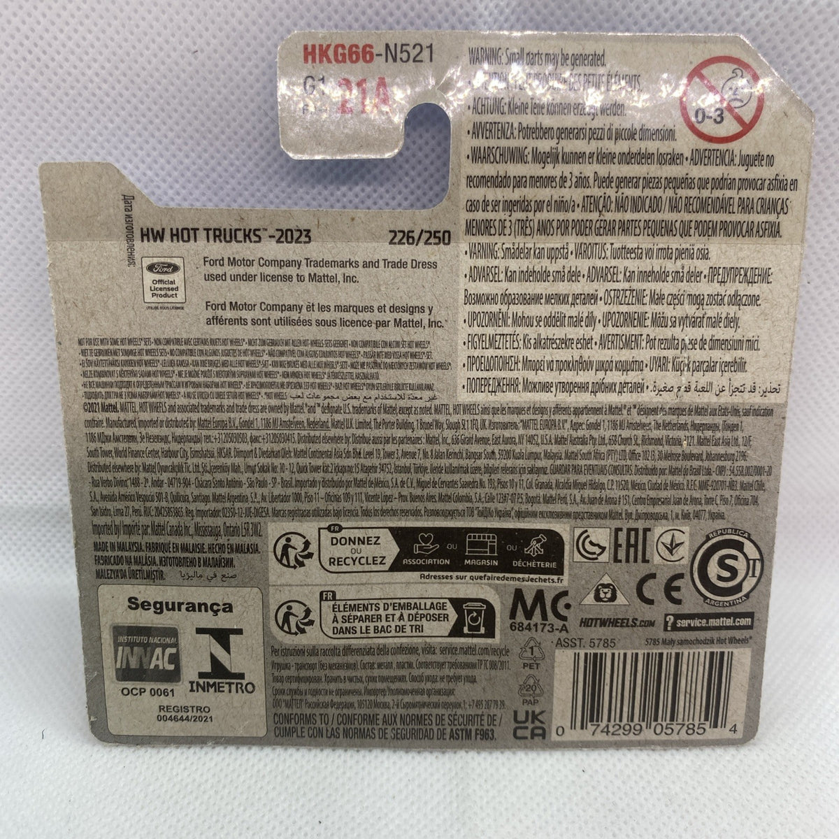 Hot Wheels truck blister card back with barcode and safety icons