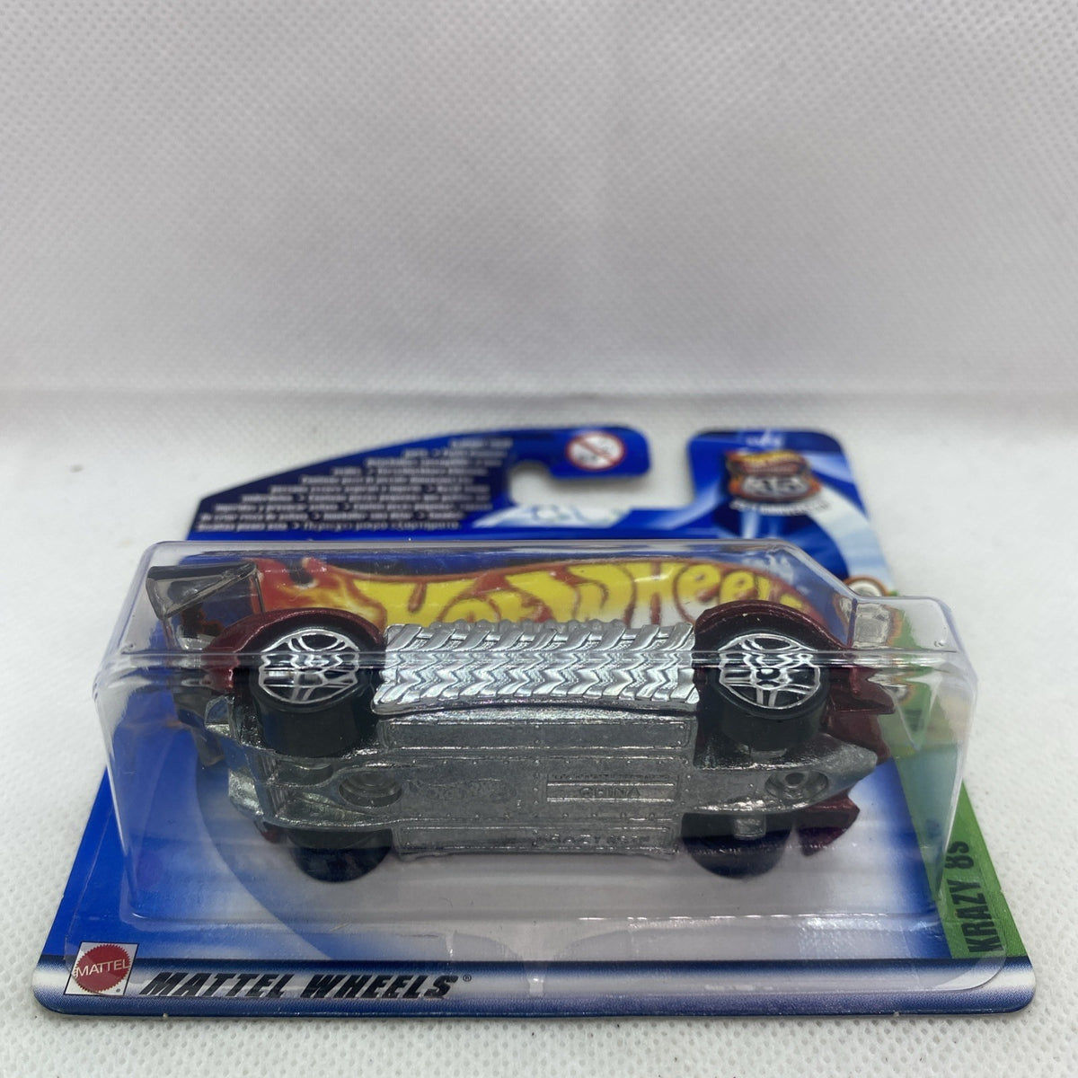 Hot Wheels die-cast car blister pack showing front grille and wheels